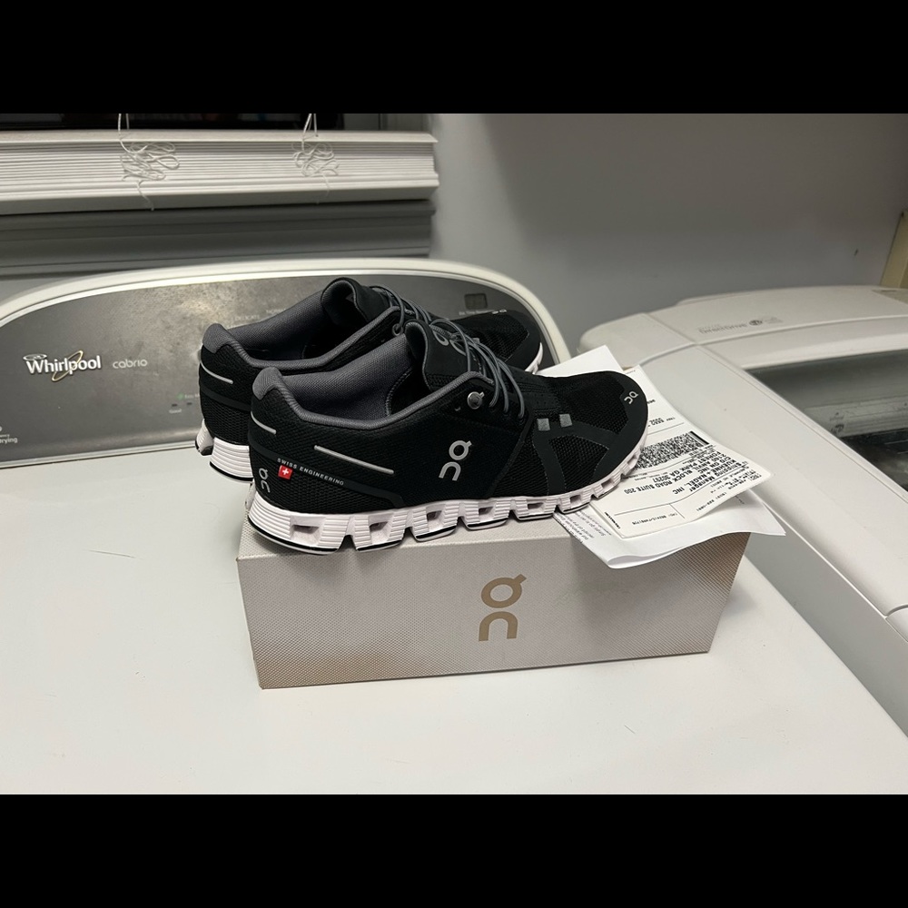 On Cloud.   Cloud Shoes excellent condition worn very few times  too tight.